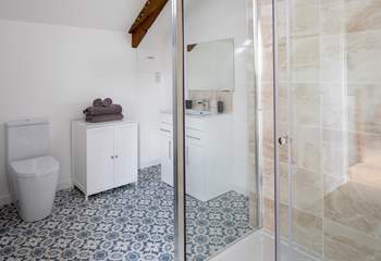The large shower in the bedroom en suite, complemented by oodles of space.