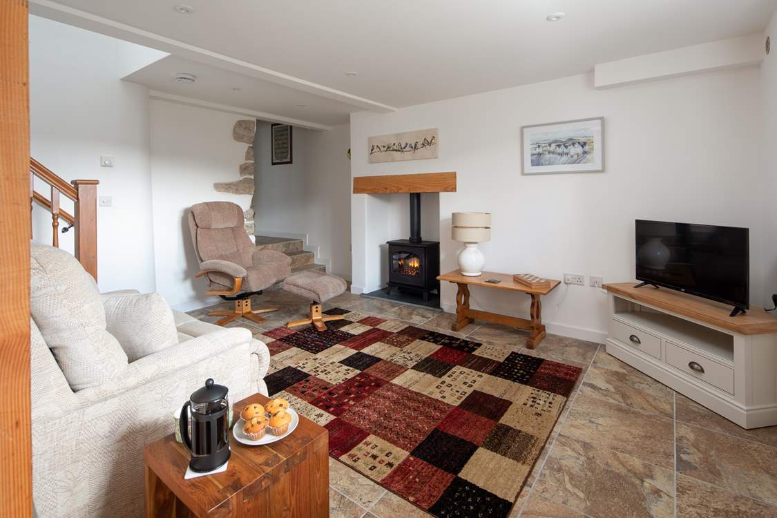 The cosy electric wood-burner really makes this room feel cosy and homely, especially on chillier nights.