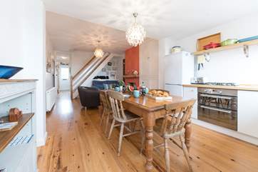 The open plan living-room with kitchen and dining areas.