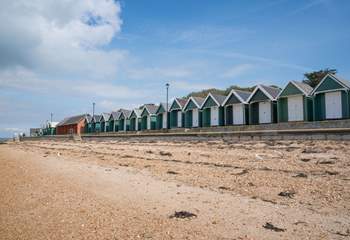 Enjoy an ice cream from The Waterside Cafe and then take a stroll along the beach.
