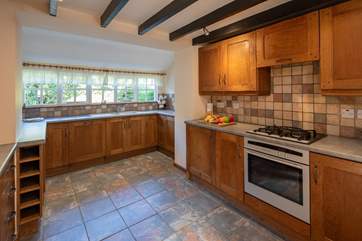 The well-equipped kitchen is huge. Perfect for the chefs amongst you.