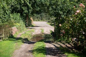 Access to the property is via this shallow ford. Driving through slowly is the key. However if you don't feel confident enough to drive through, the owners are happy to offer an alternative route/parking.