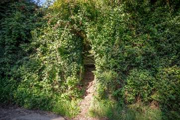 On the other side of this discreet passage you will find your very own piece of heaven in the form of your enclosed garden and summer-house.