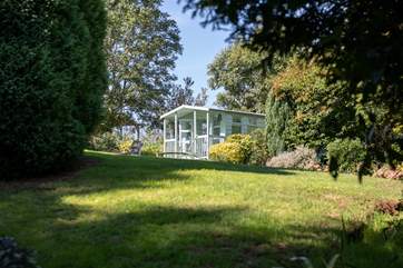 The summer-house is a great place to enjoy a spot of al fresco dining with the benefit of a roof should the weather have gloomier ideas.