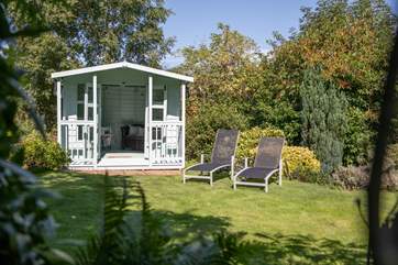 The summer-house is for your sole use. Sit back and relax in this glorious spot whilst the barbecue heats up.