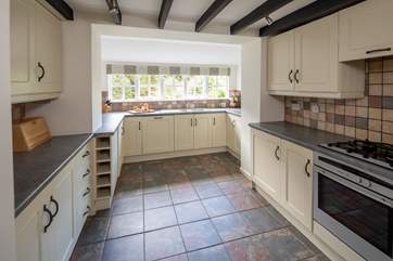 The well-equipped kitchen is huge. Perfect for the chefs amongst you.