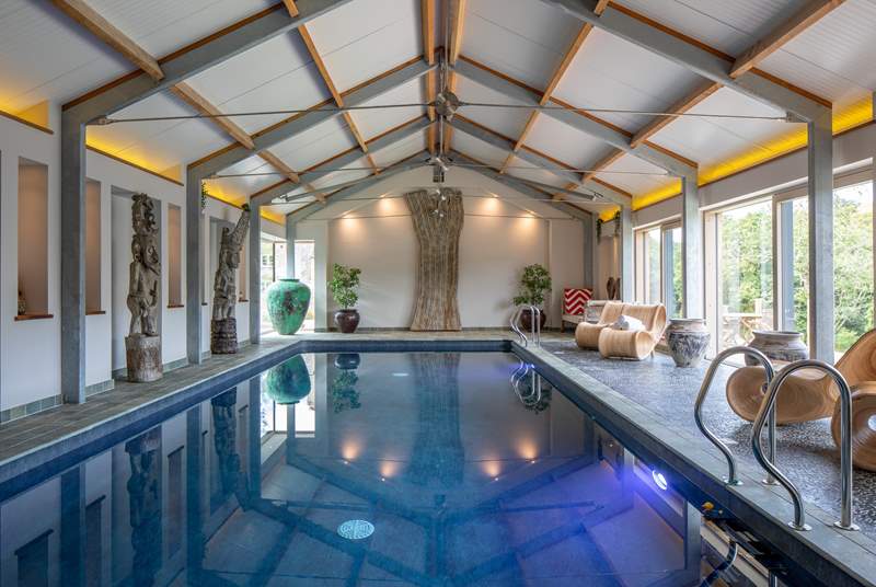 The beautiful shared heated pool. Why not enjoy a glass of something tasty on the verandah soaking up the views whilst the kids make the most of this glorious pool.