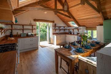 The open plan kitchen and dining area is perfect for serving up a feast.
