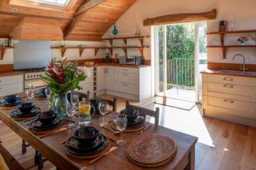 The door from the kitchen leads down and out into the fully enclosed courtyard.