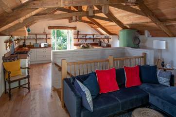 The stairs from the ground floor deliver you neatly into the heart of the upstairs open plan living-room.