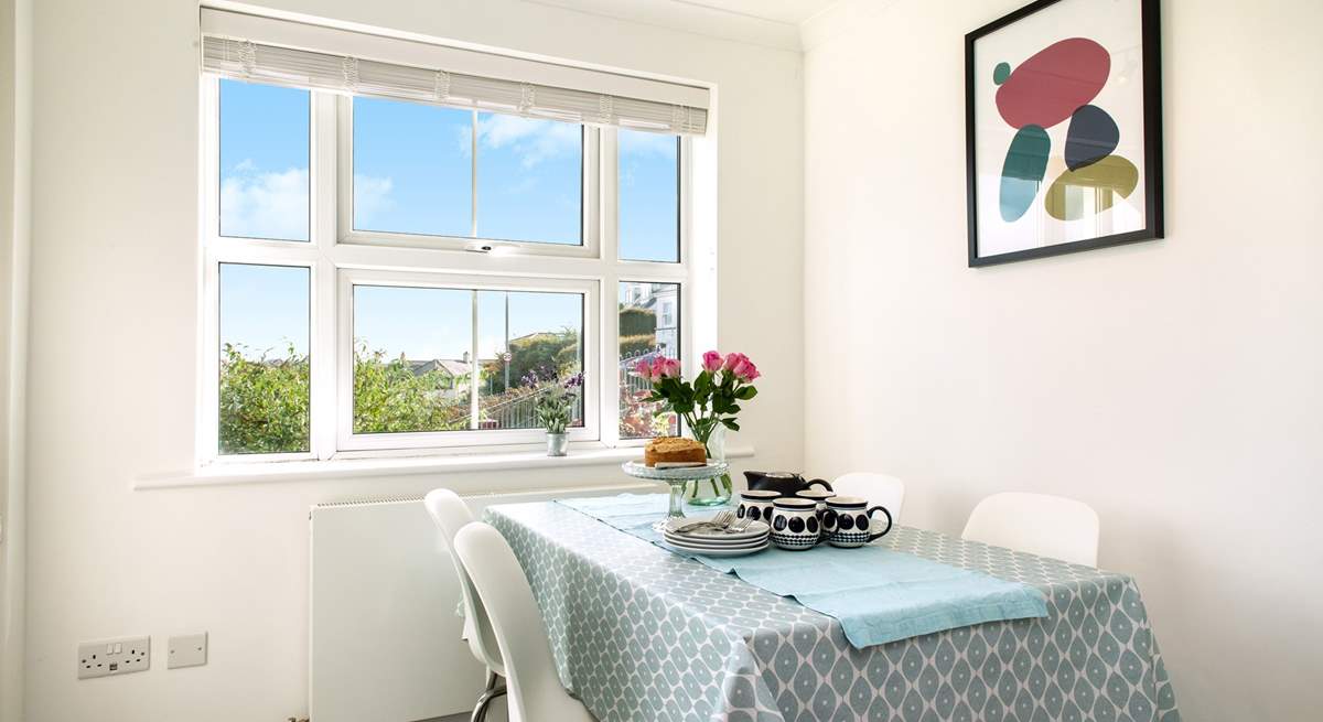 The dining-area with its panoramic view of the bustling estuary. 