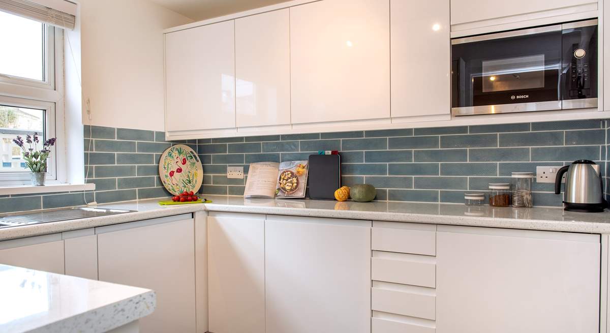 The well-equipped kitchen is a delight to cook in. 