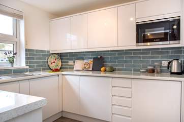 The well-equipped kitchen is a delight to cook in.