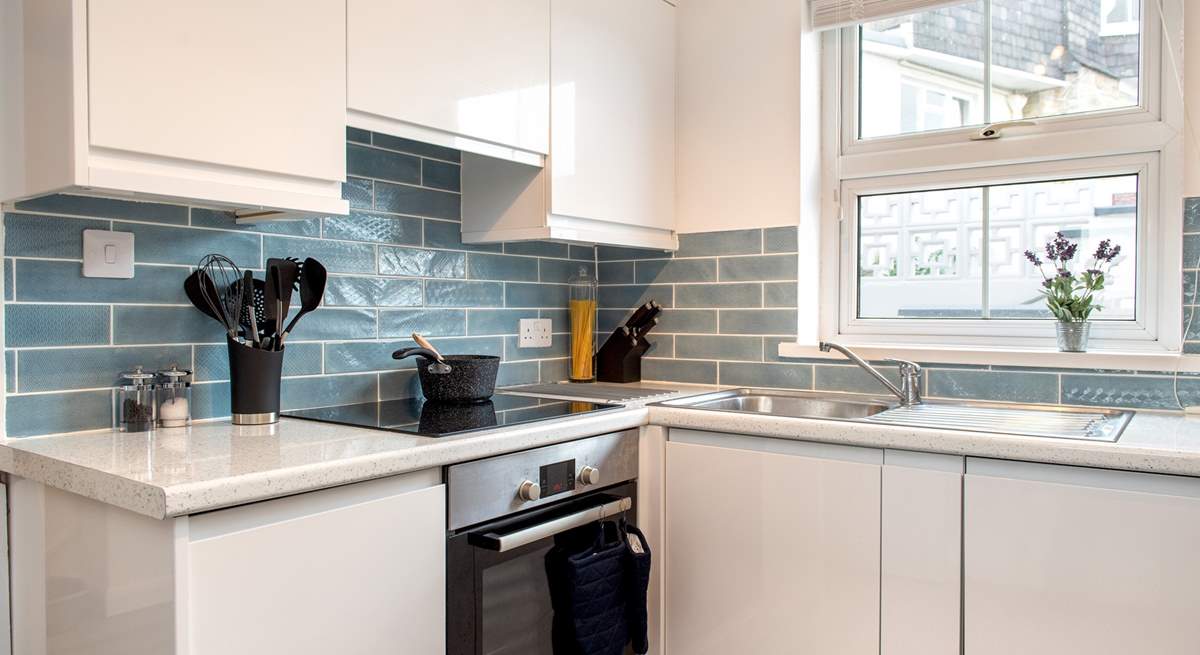 The stylish kitchen is light and airy. 