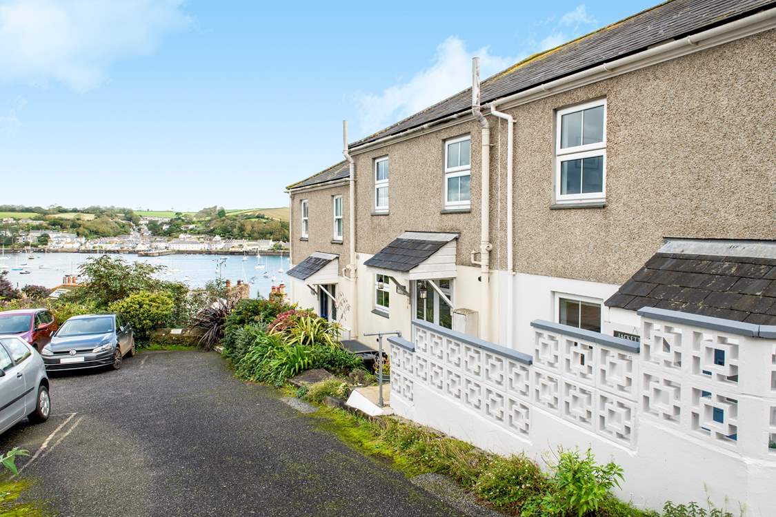 The car parking space for Jacketts Cottage is the space to the left of the silver golf.