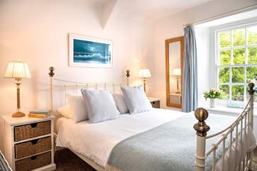 The cottage has two charming bedrooms.