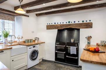 The kitchen is full of character features