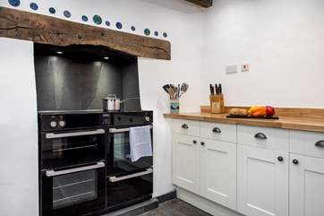 The kitchen comes complete with a range style cooker