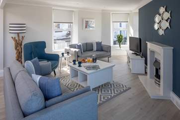 The very cosy and comfy living-area. Perfect to snuggle up in after a full day of activity and adventure.