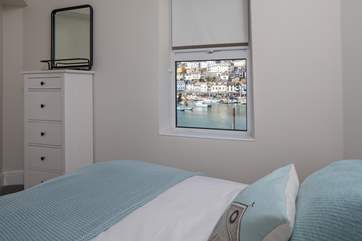 Bedroom 2 has equally stunning views out over the harbour and beyond.