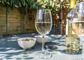 Enjoy an early evening drink in the garden.