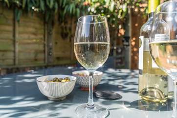 Enjoy an early evening drink in the garden.