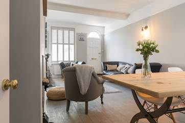 Relaxing pastel hues make the living space the perfect place to unwind.