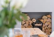 The ornamental fireplace is the centre piece of the living space.