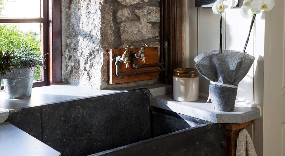 The characterful slate sink in the utility-room.