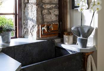 The characterful slate sink in the utility-room.