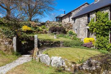 The beautiful garden and the very friendly owner's barn, who lives next door.