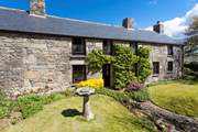 Outside you are truly spoilt for choice, with a beautiful three-tiered front garden.