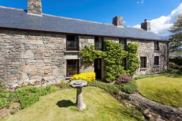 Outside you are truly spoilt for choice, with a beautiful three-tiered front garden.