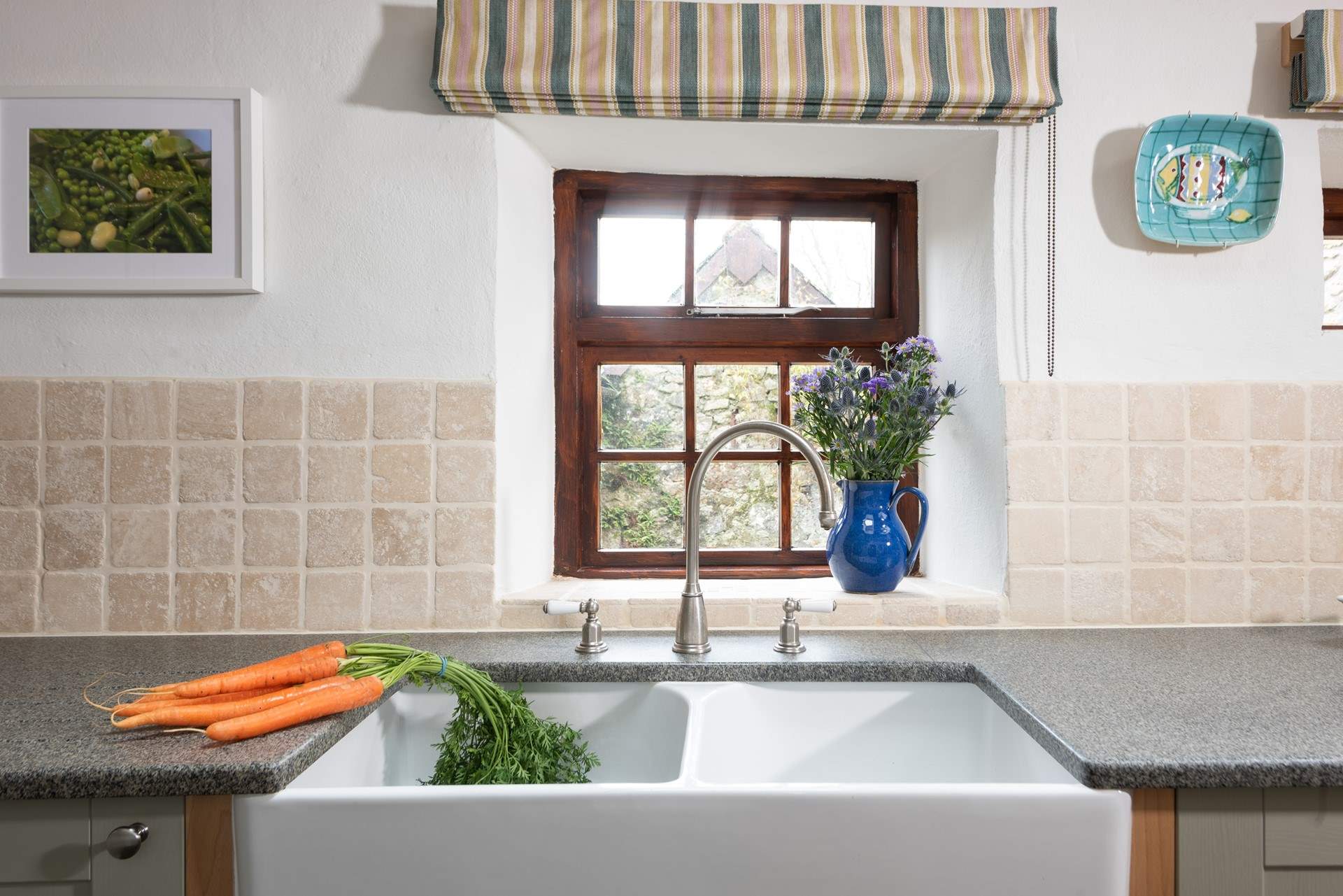 A dual aspect Belfast sink is a beautiful addition to this fabulous kitchen.