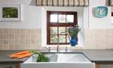 A dual aspect Belfast sink is a beautiful addition to this fabulous kitchen. - Thumbnail Image