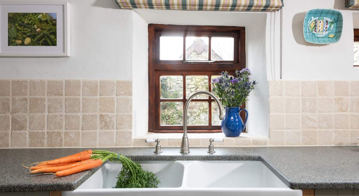 A dual aspect Belfast sink is a beautiful addition to this fabulous kitchen.