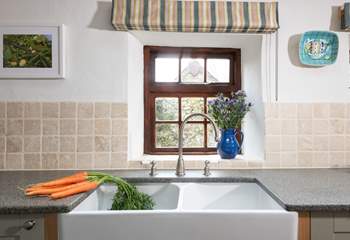 A dual aspect Belfast sink is a beautiful addition to this fabulous kitchen.