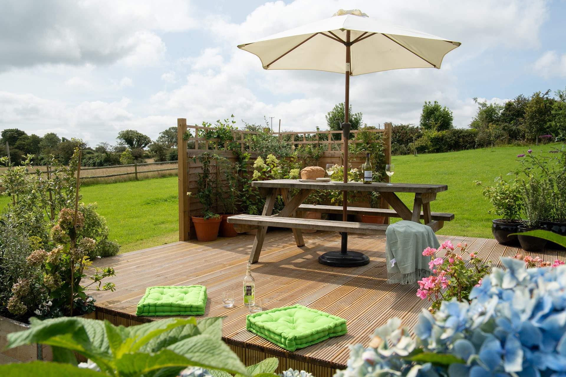 The outside decking/table area is the perfect spot for breakfast and a morning coffee, or perhaps in the evening with a glass of wine while you watch the sun set.