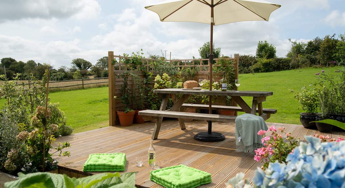 The outside decking/table area is the perfect spot for breakfast and a morning coffee, or perhaps in the evening with a glass of wine while you watch the sun set.