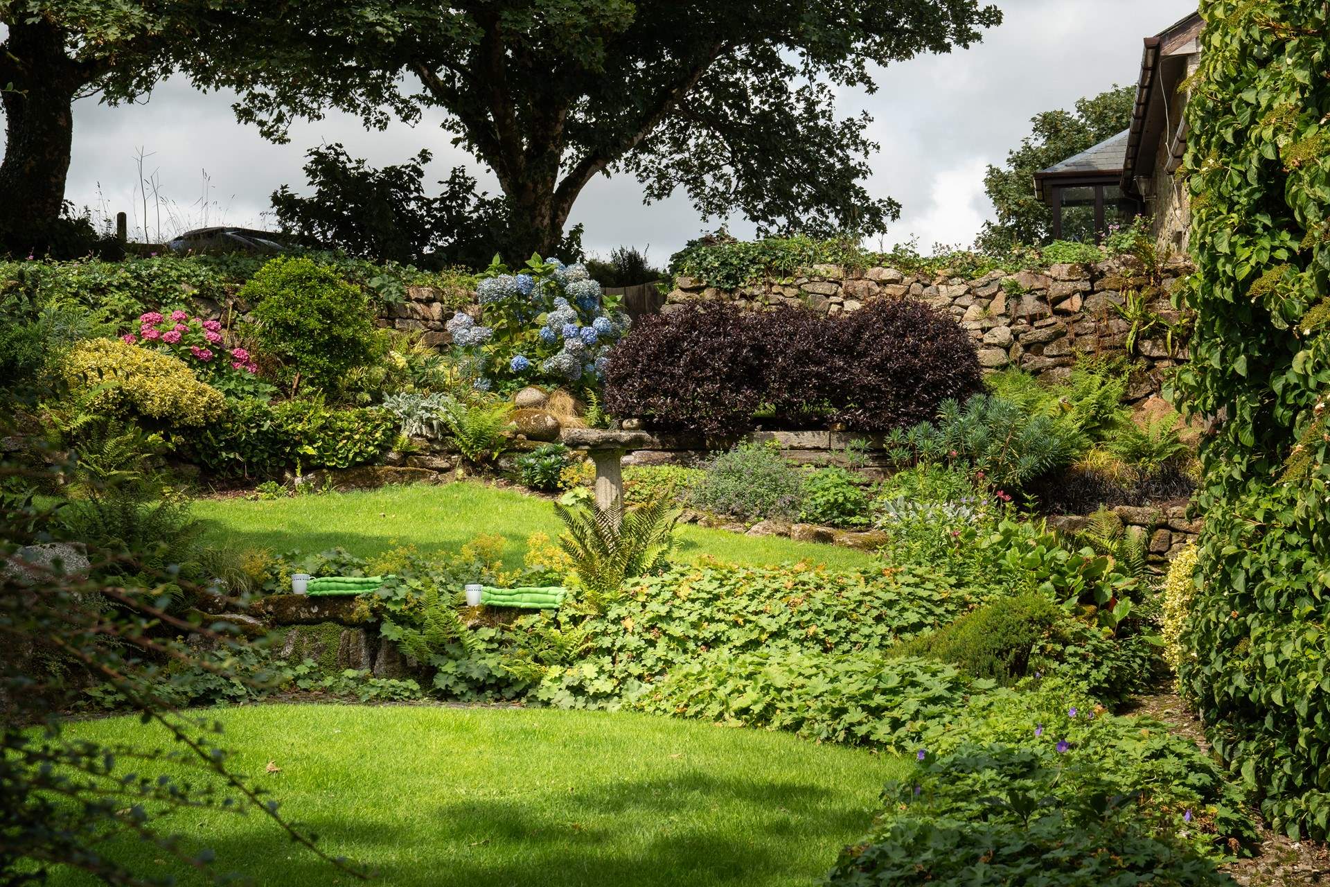 The garden is heavenly and the little cushions are perfect to perch on with a good book in hand...