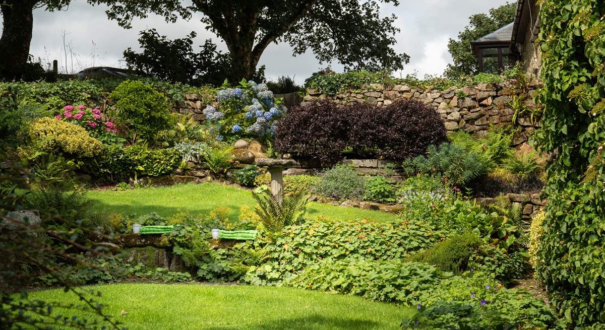 The garden is heavenly and the little cushions are perfect to perch on with a good book in hand...