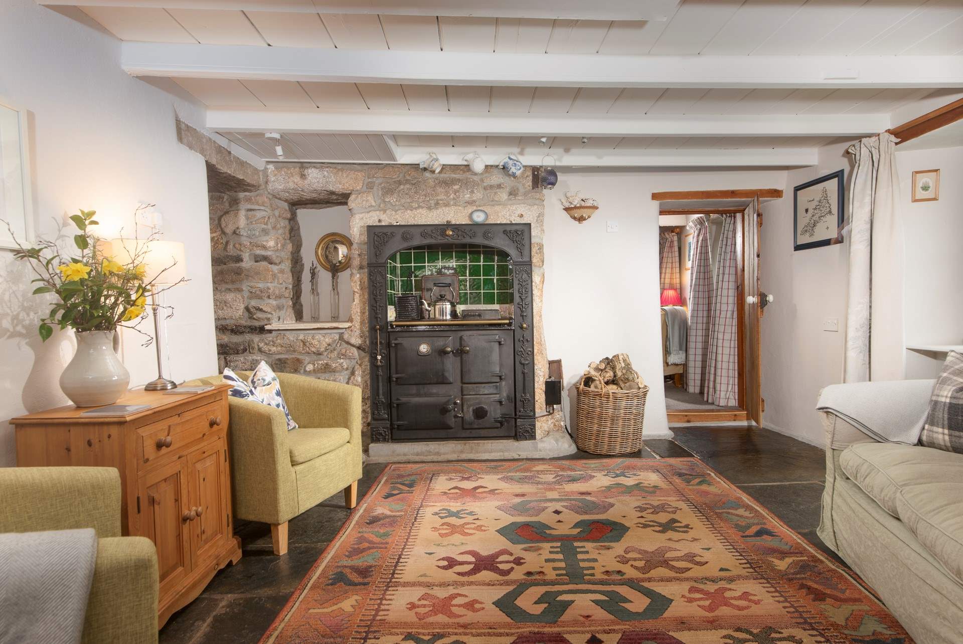 The dining-room is full of character like this gorgeous ornamental Rayburn.