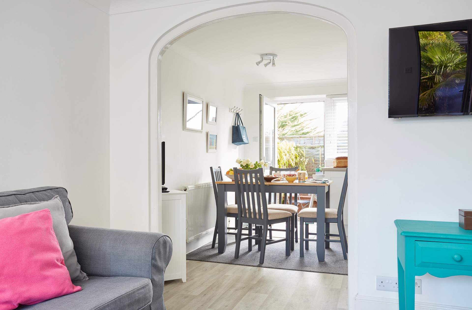 View from the living-room area towards the kitchen and outside rear patio.