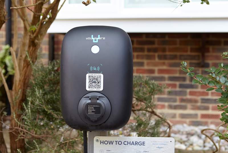 The electric car charging point outside the front of the property.