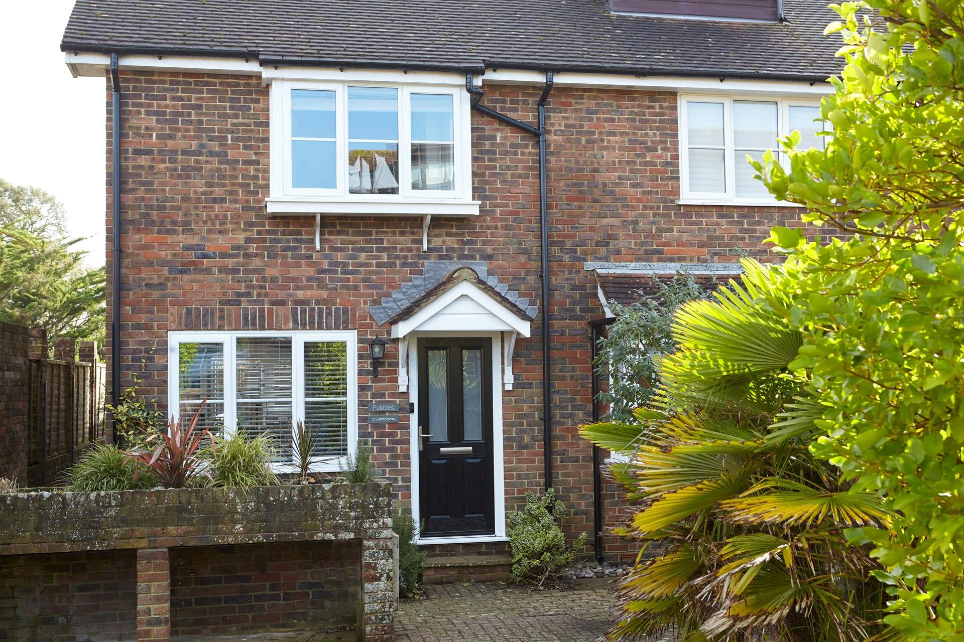 Welcome to Pebbles located in a small courtyard development. 