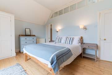 Bedroom 2 has a king-sized bed and amazing sea views.