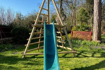 The younger ones will enjoy the climbing frame in the garden.
