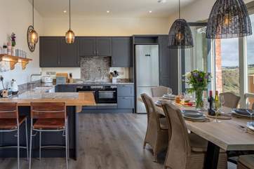 The open plan kitchen and dining area is a fabulous space. Perfect for whipping up and serving that special meal.