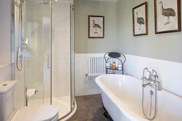 Bedroom 1 also boasts this beautiful en suite with a fabulous roll-top bath.