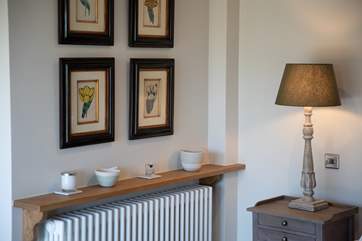 Beautiful decor and homely touches in Bedroom 1.